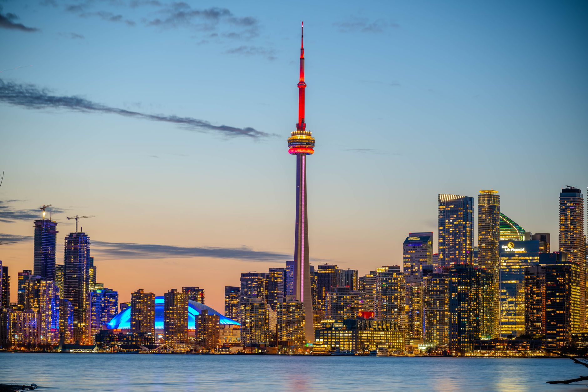 cn tower and toronto cityscape at sunset